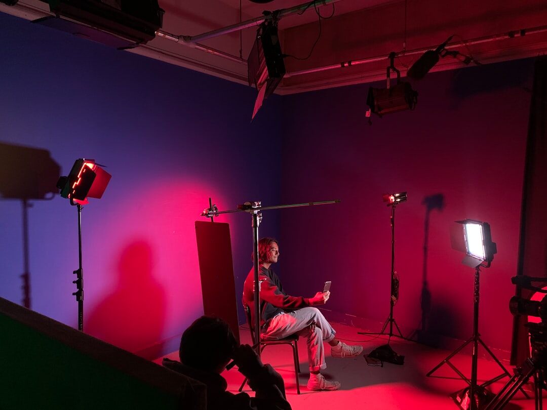 Empty television studio set with dramatic colorful stage lighting